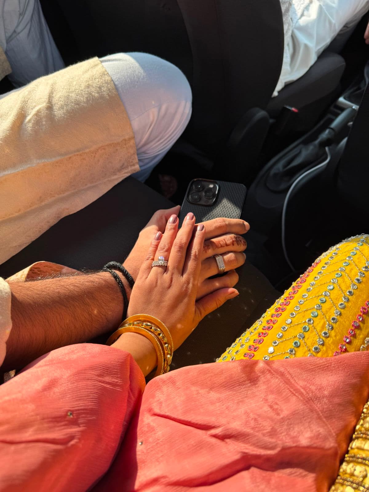 Shaurya and his wife wearing their House of Darya wedding bands